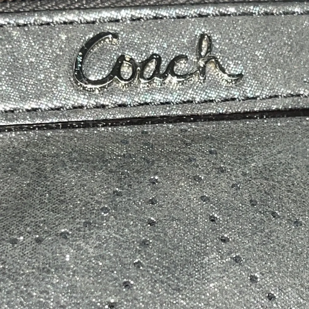 Coach signature C silver pewter metallic leather wristlet clutch